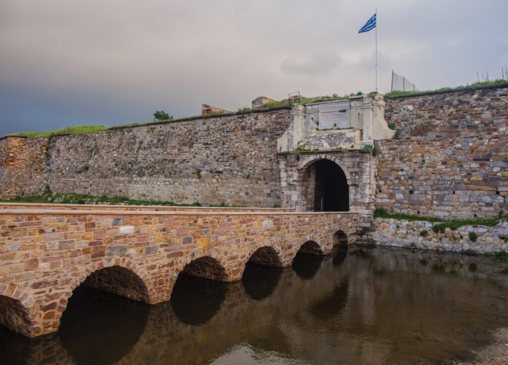 Stone bridge over water in Chios